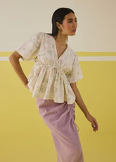 A Model Wearing Multicolor Handwoven Organic Cotton Sweet Sunshine Organic Cotton Peplum Top, curated by Only Ethikal